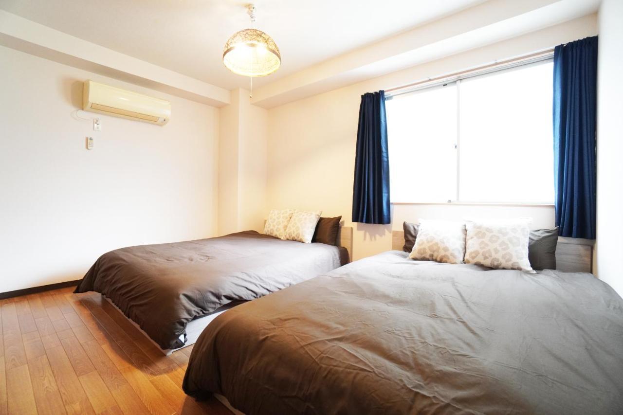 Akimi Building Apartment Osaka Bagian luar foto