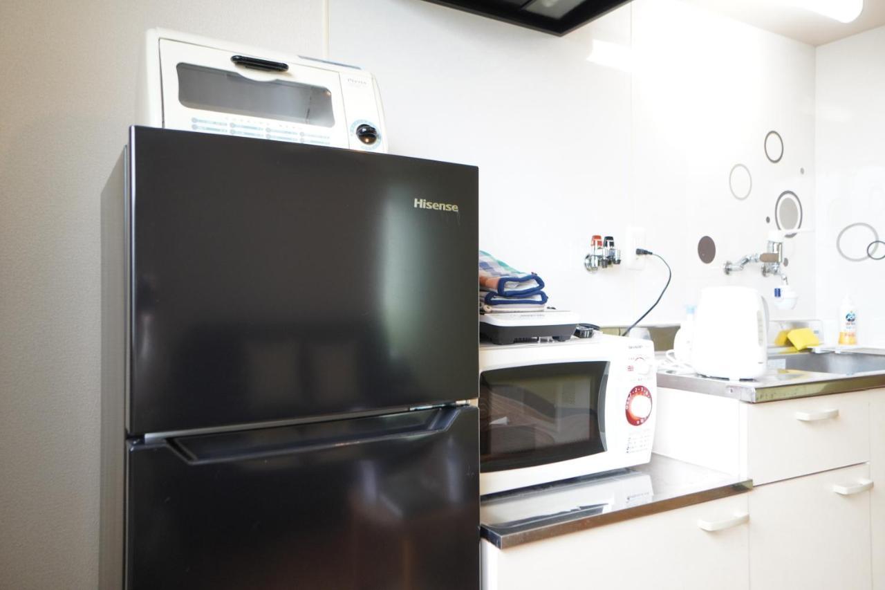 Akimi Building Apartment Osaka Bagian luar foto