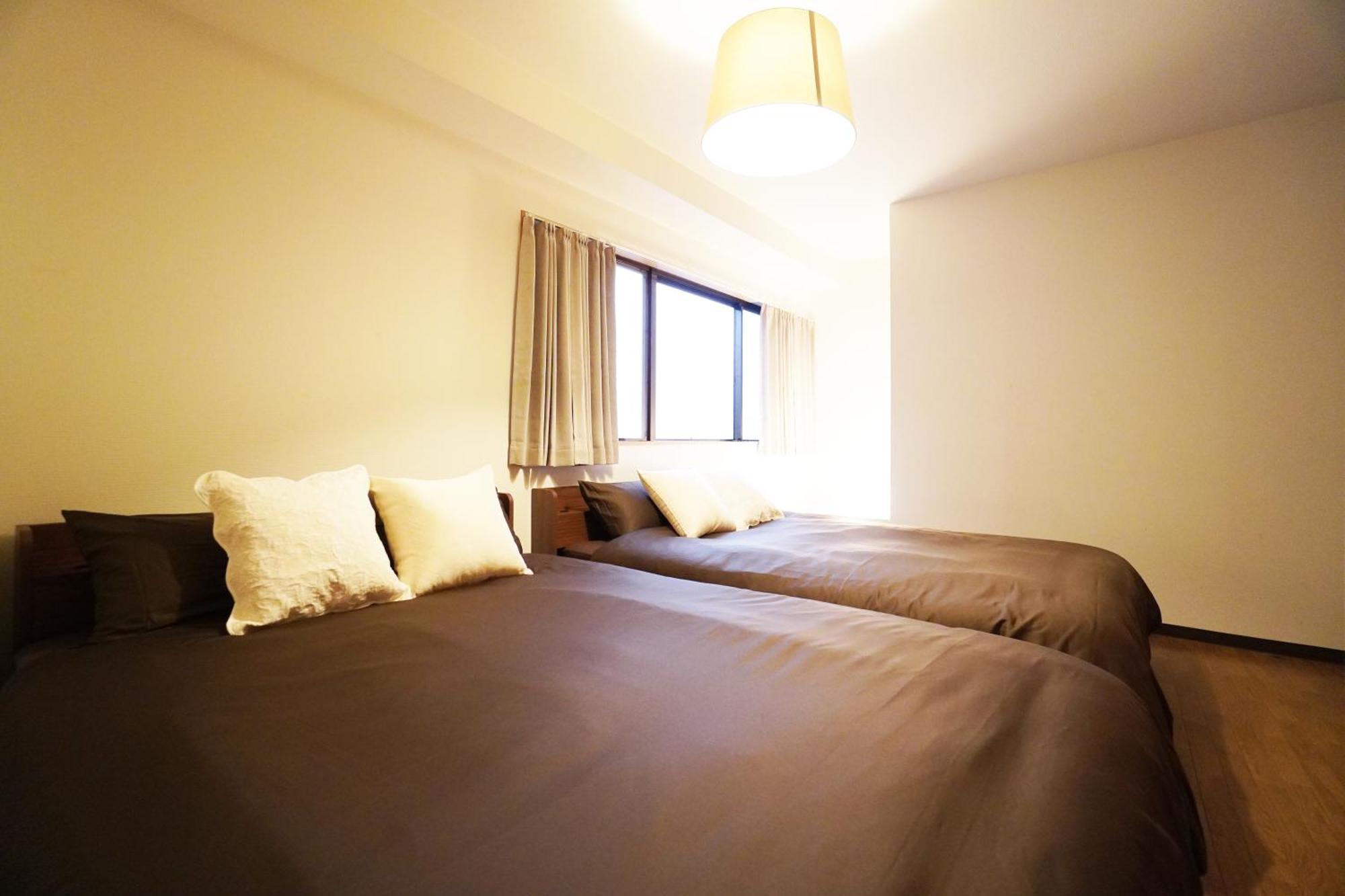 Akimi Building Apartment Osaka Bagian luar foto